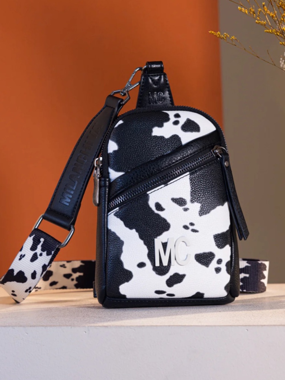 Cow-Print Sling Crossbody‎ Bag in Black & White